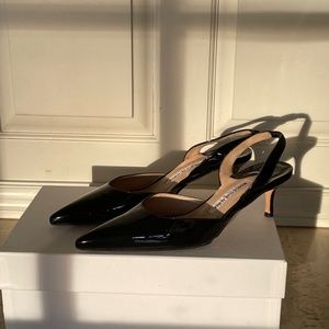 Manolo Blahnik patent leather sling backs